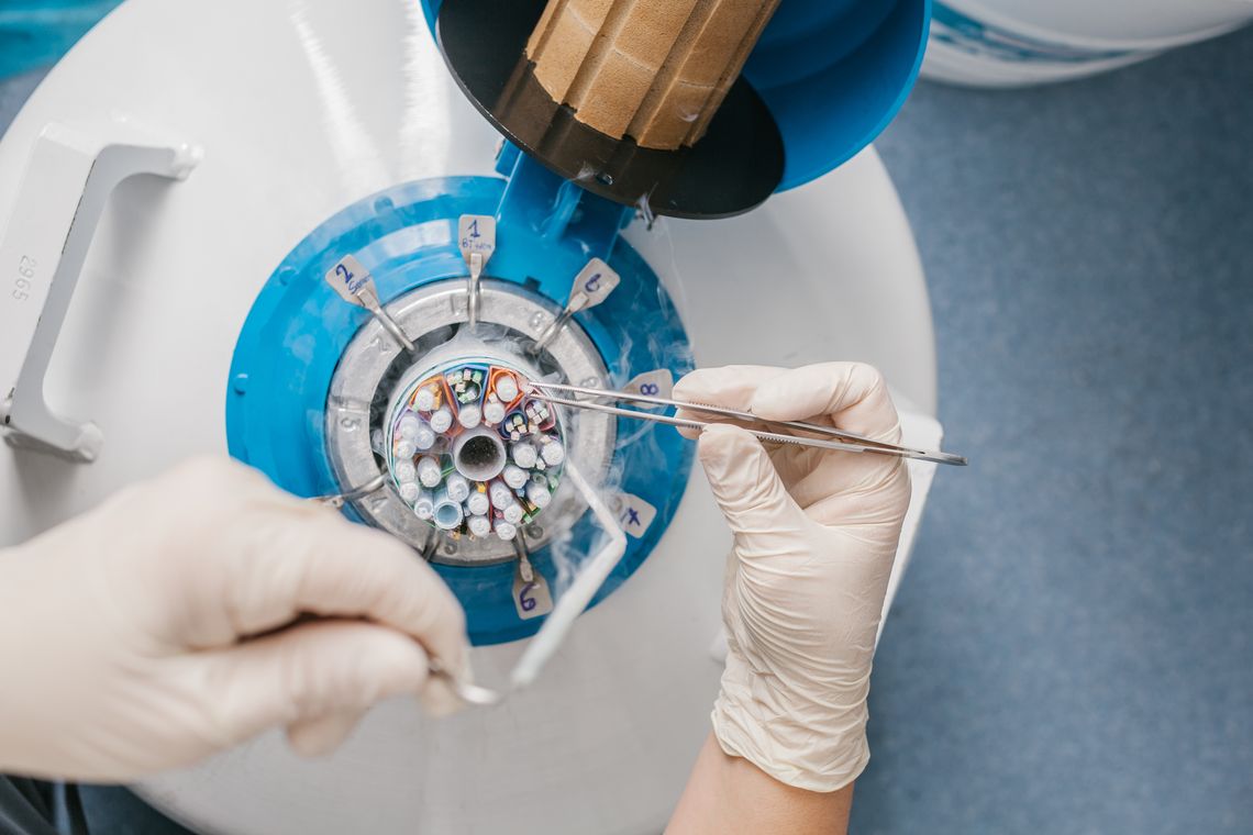 close up image of medical machine with test tubes