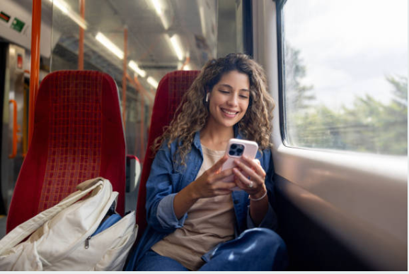 happy woman on a train